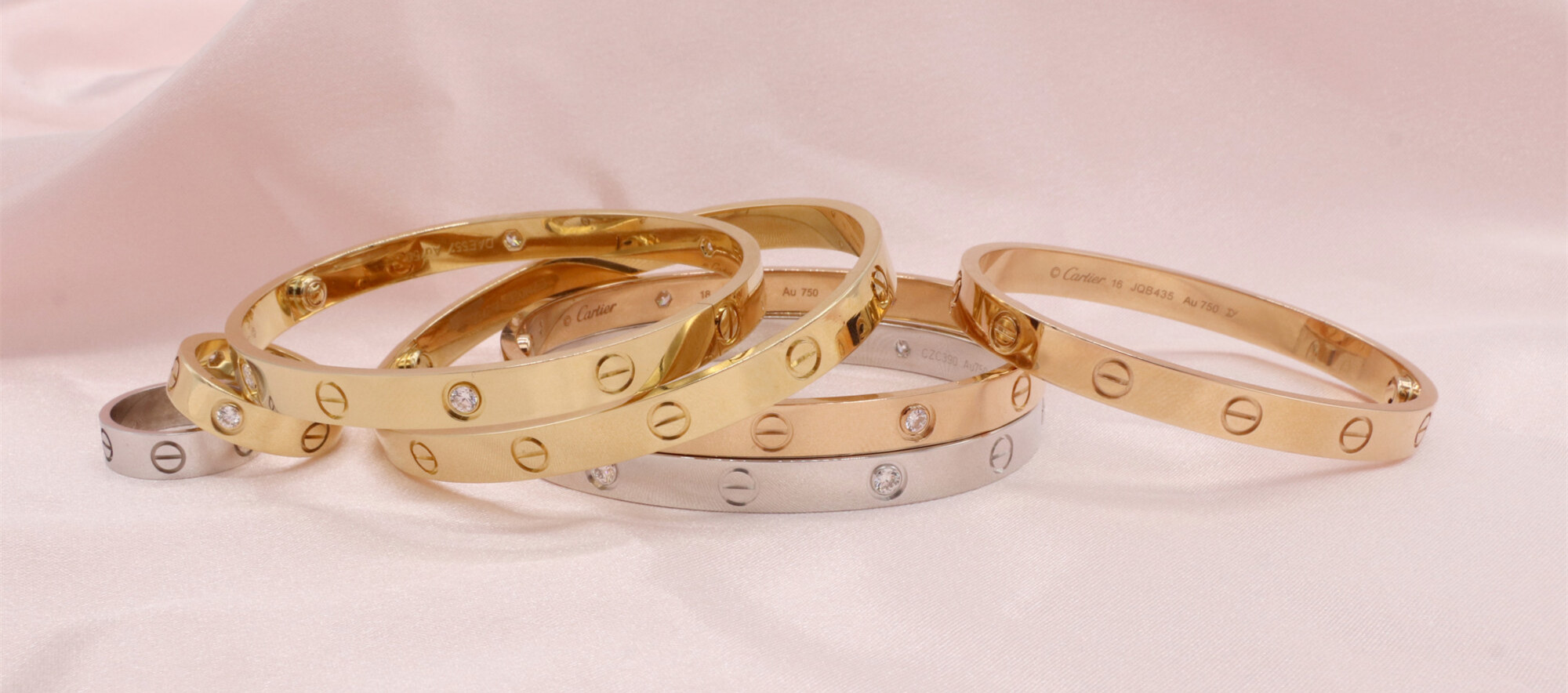 https://www.tooblingjewels.com/18k-rose-gold-yellow-gold-cartier-love-bracelet-4-diamonds-copy-b6070017/